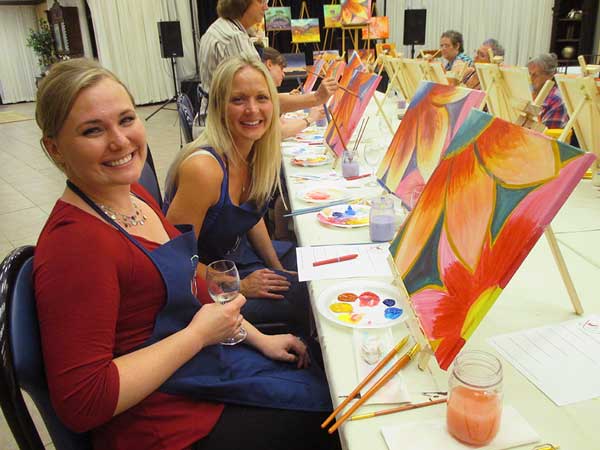 Wine and flowers are a fun combination in this paint and sip class