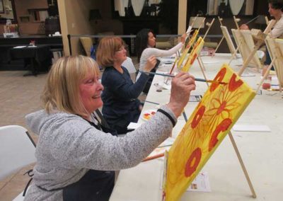 Sunflowers bring smile to painter