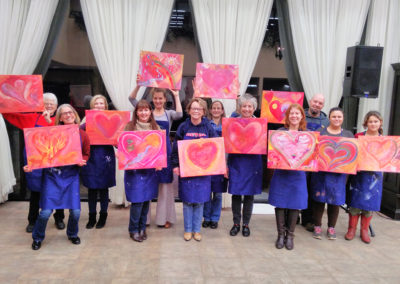 Hearts and wine painting class party
