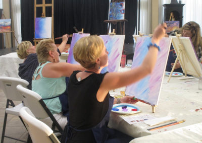 Backgrounds are applied in paint and wine class Grass Valley CA