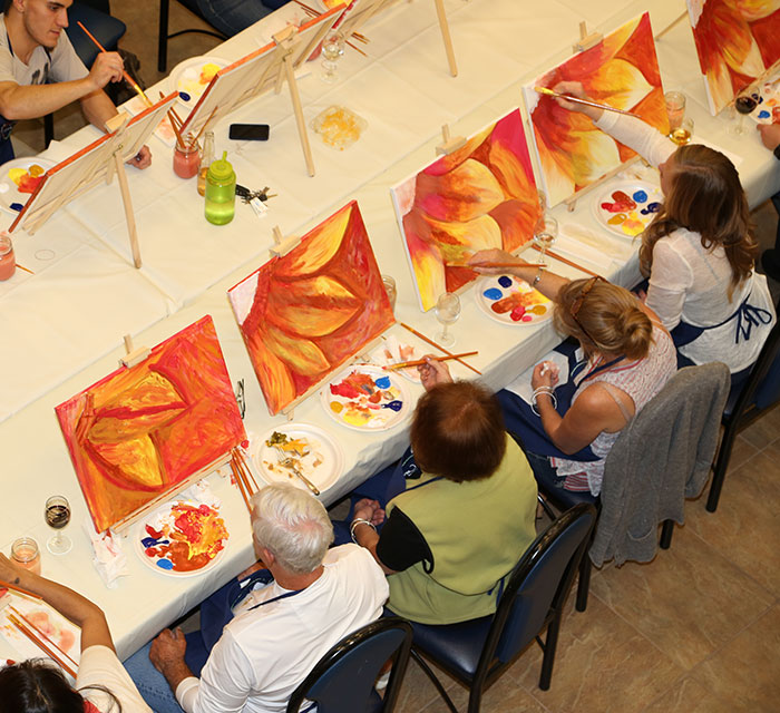 Painting sunflowers in Grass Valley CA paint and wine class