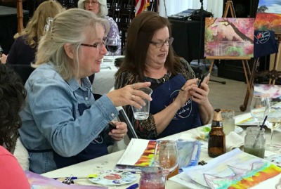 Paint & wine classes are a fun way to get together with friends!
