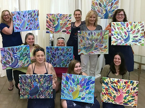 Group shows off the peacock paintings